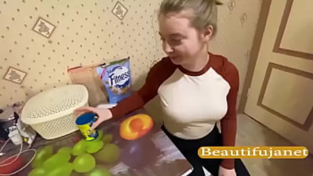 Russian babe gives a blowjob to her friend in the kitchen
